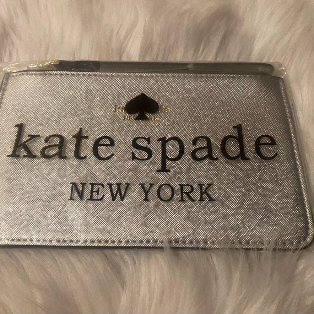 NEW in bag Kate Spade Clutche wristlet purse wallet silver zip up with strap